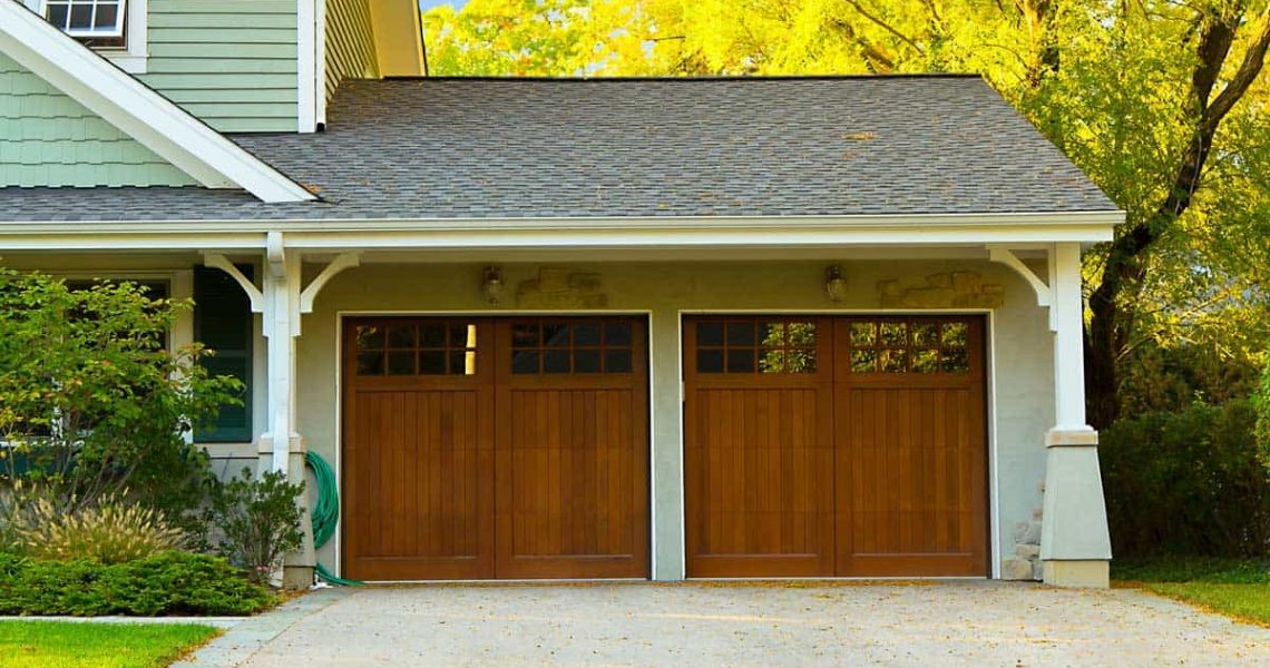 split level house with double garage door