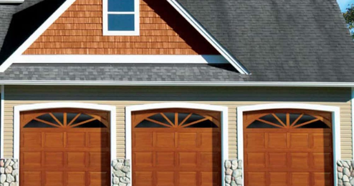 traditional wood overhead garage door on house